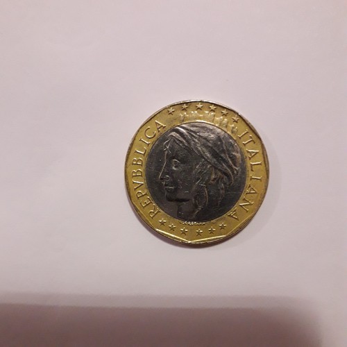Moneta 1000 lire con - lire, errori